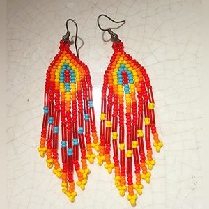 Handmade Bohemian fire red yellows and blues beaded Fringe dangle earrings